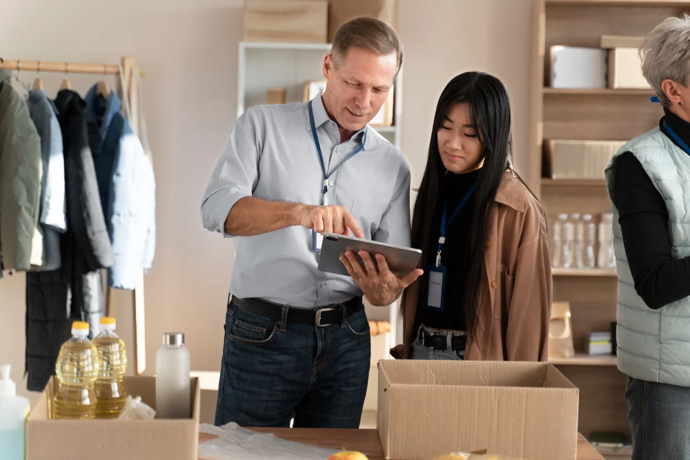 Sourcing specialist negotiating with supplier in China factory or trade fair setting Sourcing specialist negotiating with supplier in China factory or trade fair setting